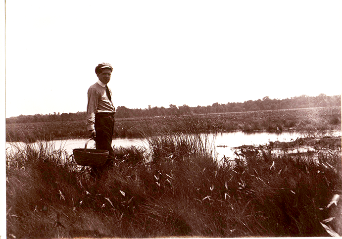 Robert Earl Buchanan standing in a field