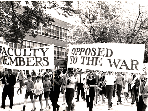 Image of faculty at the VEISHEA parade "March of Concern"