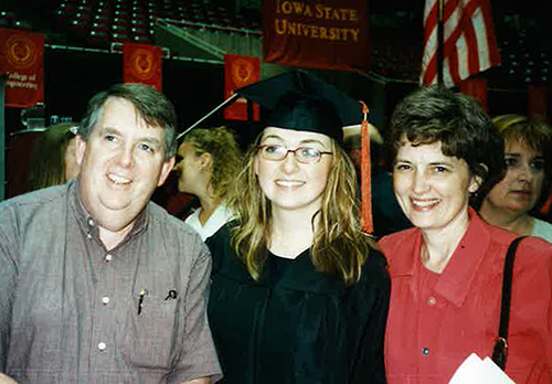 Tracy Regan Brinkmeyer between father and mother at Hilton graduation